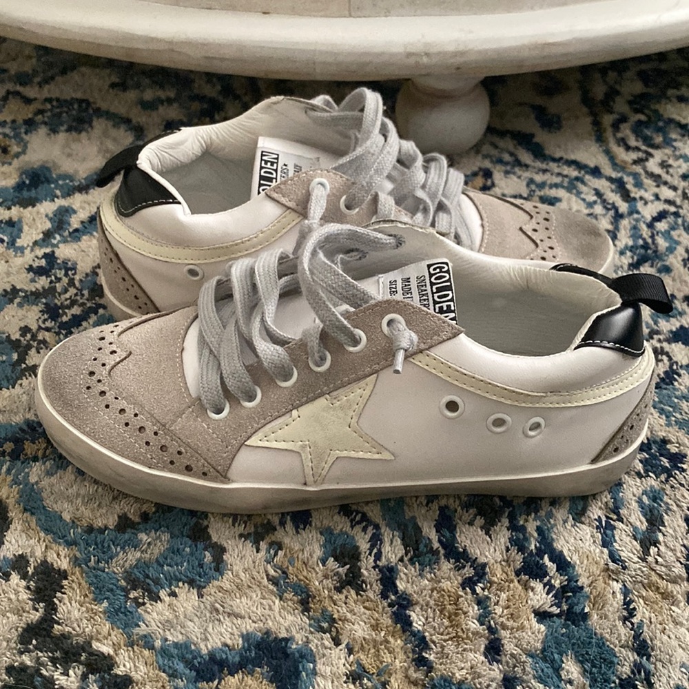 Sarabasics Collection star wingtip sneakers.